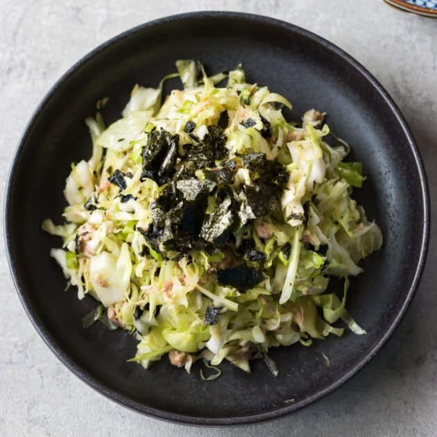 cabbage and tuna salad served on a plate.