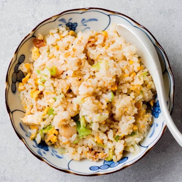 Seafood lettuce fried rice served on a plate.