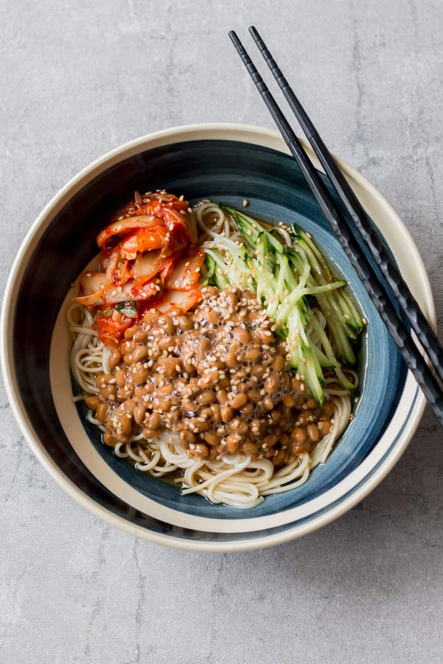 Kimchi natto somen served in a bowl.