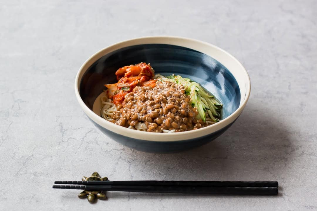 Kimchi natto somen served in a bowl.