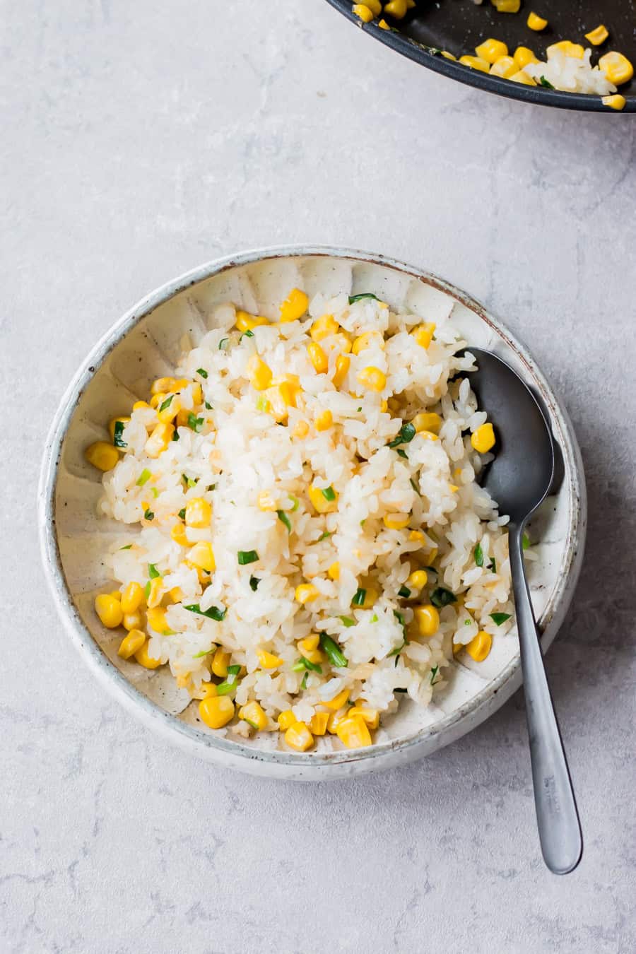 Corn fried rice served on a bowl.