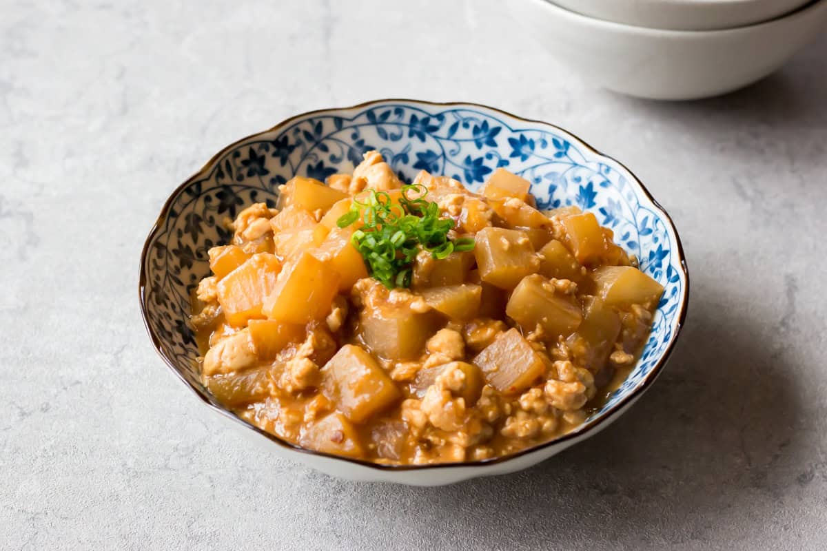 Daikon Simmered in Spicy Miso Sauce served in a bowl.