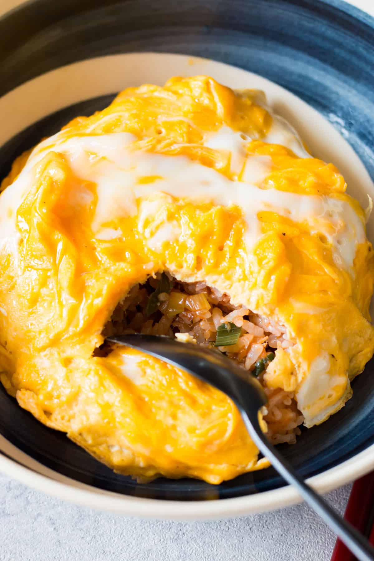 Omurice served in a bowl.