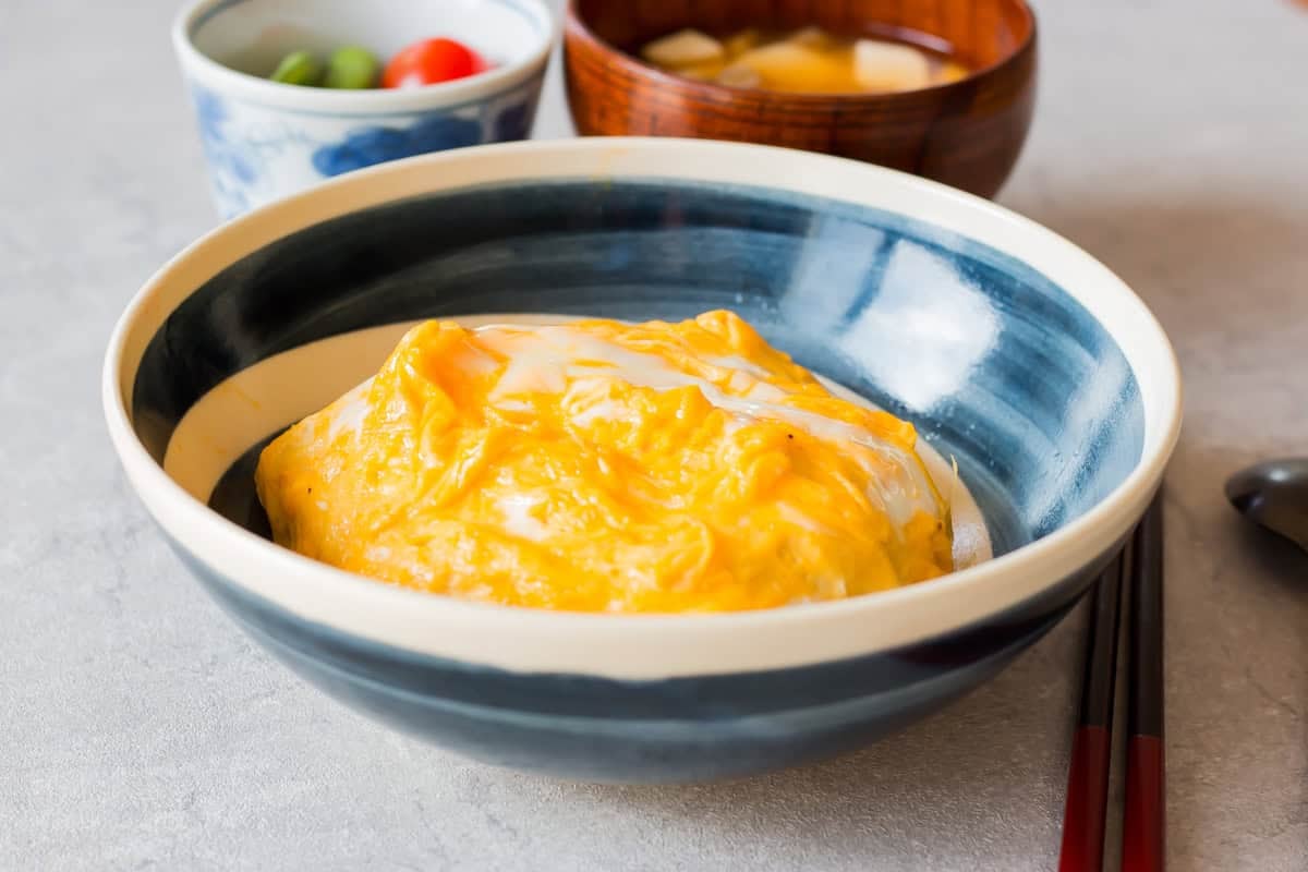 Omurice served in a bowl.