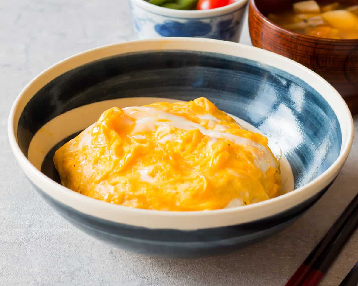 Omurice served in a bowl.